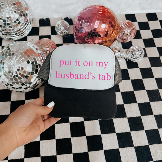 Put It On My Husbands Tab Trucker Hat PREORDER